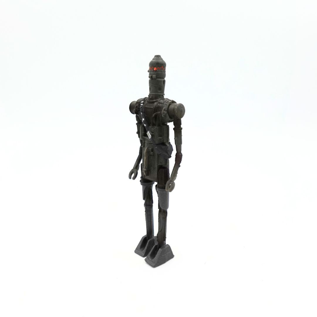 1996 Star Wars IG-88 droid with orange eyes and a dark grey construction