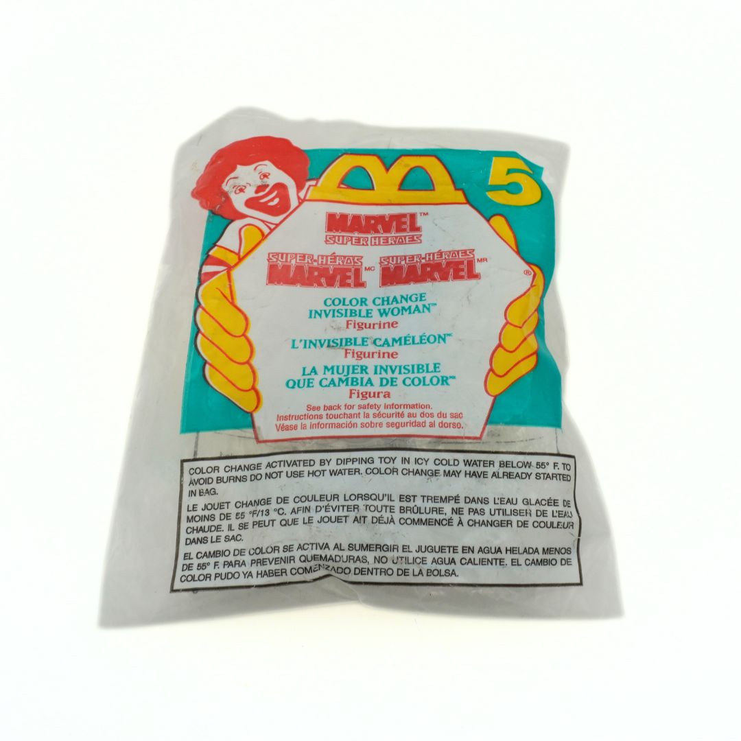 Unopened Happy Meal 1996 toy of the Marvel Super Heroes Invisible Woman with a colour change feature