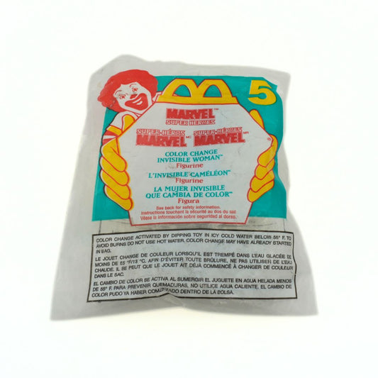 Unopened Happy Meal 1996 toy of the Marvel Super Heroes Invisible Woman with a colour change feature