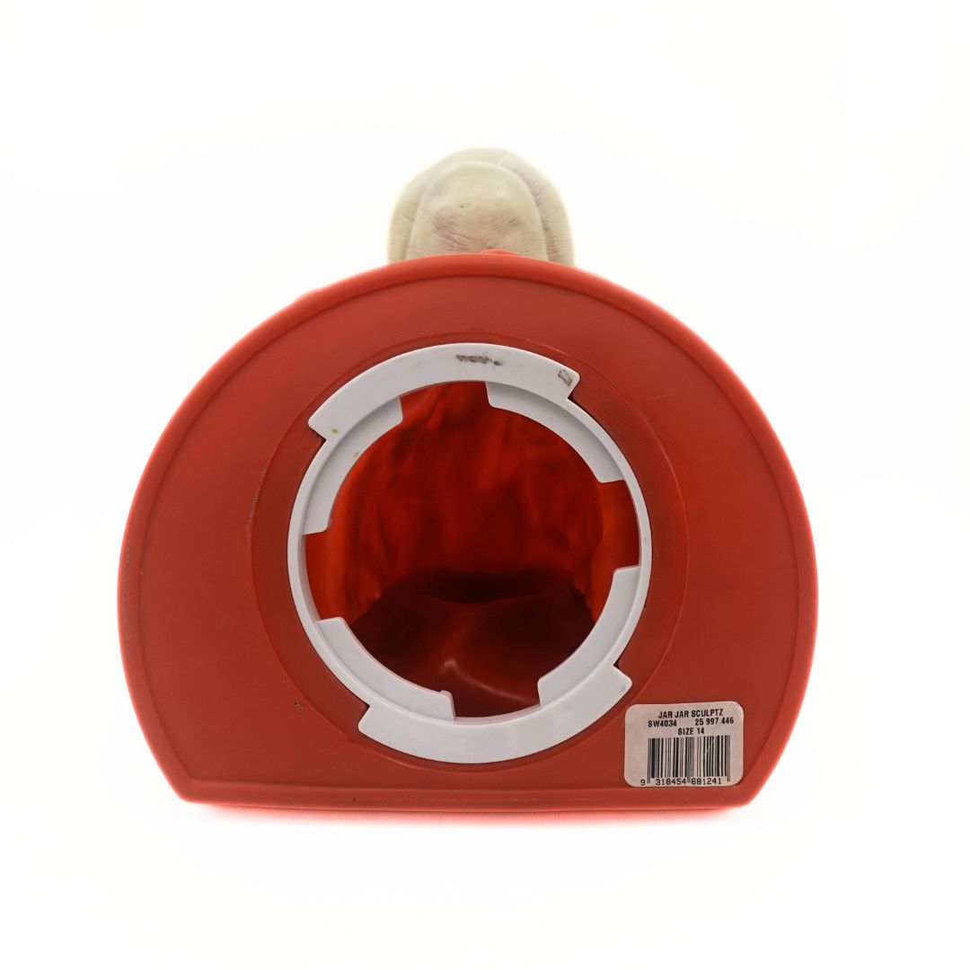 Underside of a vintage Jar Jar Binks piggy bank showing the barcode and opening