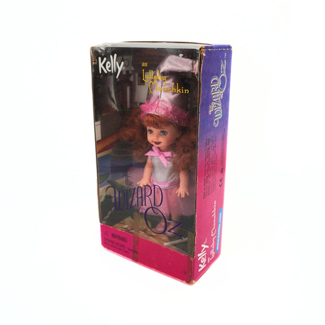 1999 Mattel Barbie Kelly as Lullaby Munchkin doll in a pink and purple box with a pink outfit