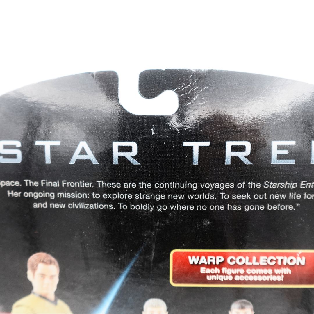 Close up of the Captain Kirk 2009 Star Trek Warp Collection figures swingtag on the cardback