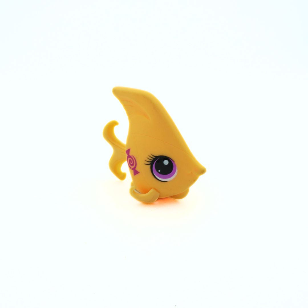 Yellow Angelfish toy with a purple eye by Littlest Pet Shop