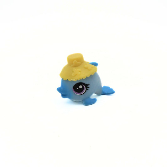 Small blue toy figure with a yellow hat on a white background