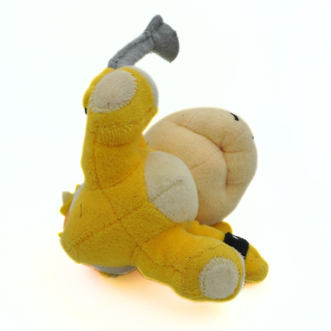 Yellow plush toy with a beige belly