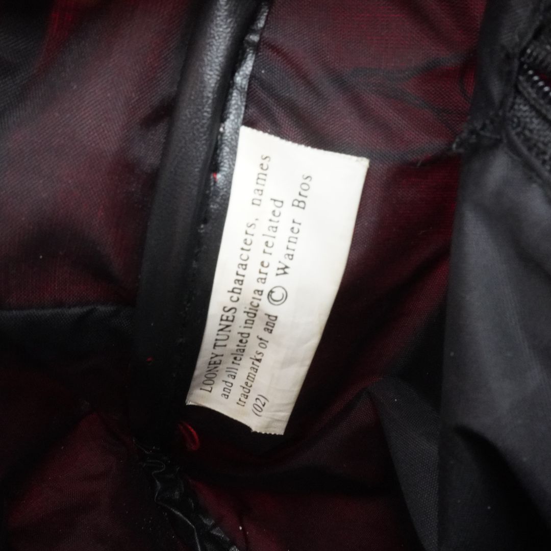 Internal tag on a vintage Tweety Bird Looney Tunes Bowling Bag showing the copyright information