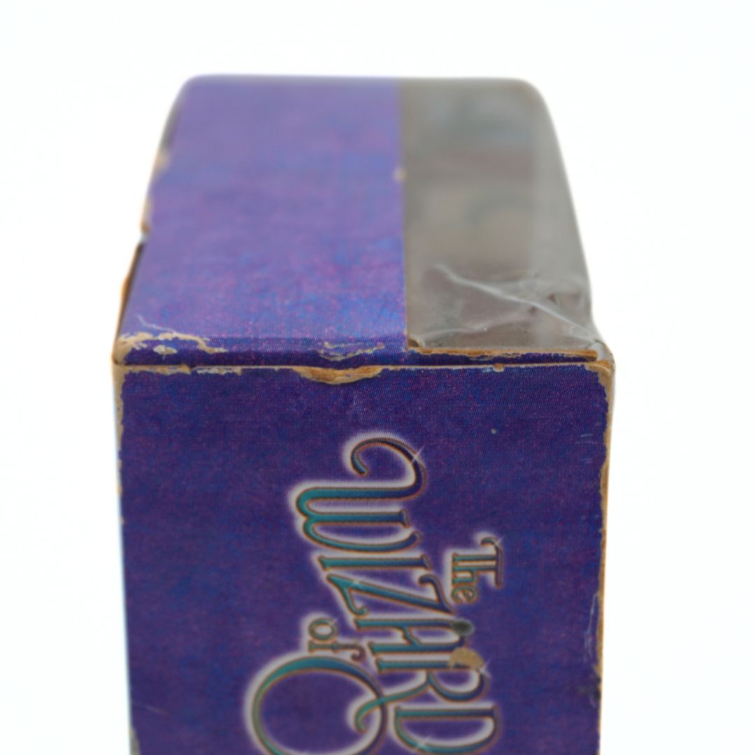 Side of the Munchkin Lullaby box showing some wear and damage to the cardboard