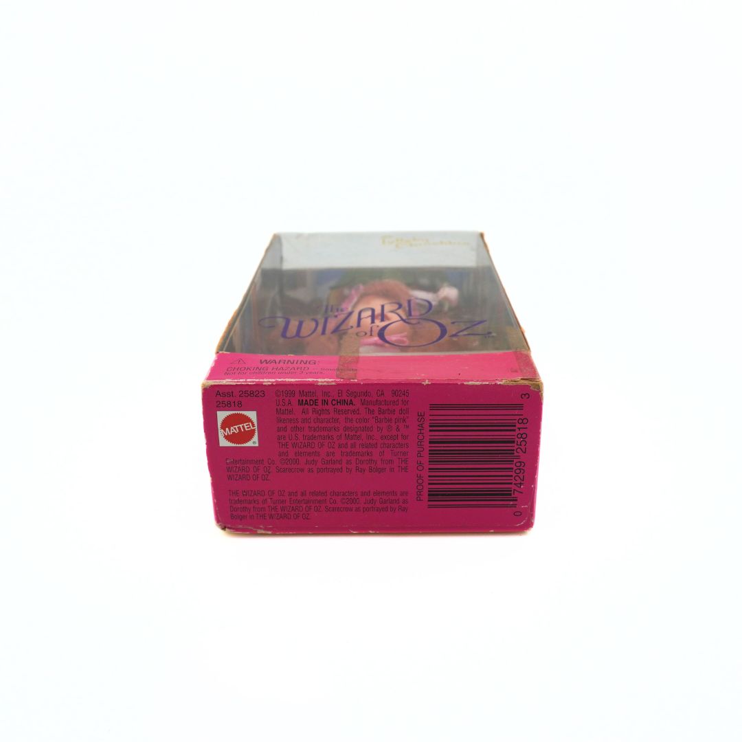Underside of a Wizard of Oz Munchkin doll showing the barcode and copyright information