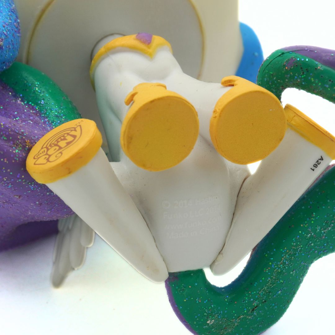 Toy with multiple colorful nozzles on a white background