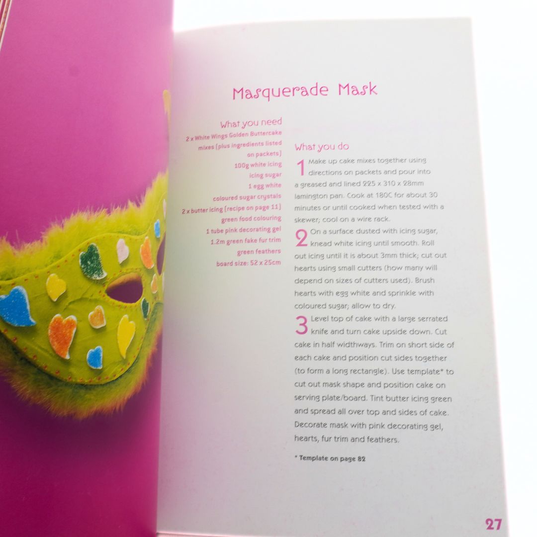 Colorful mask with a recipe book page on a pink background