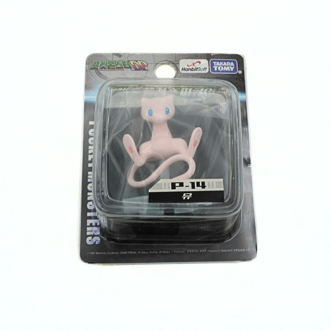 Pokémon Mew action figure in packaging with Takara Tomy branding.