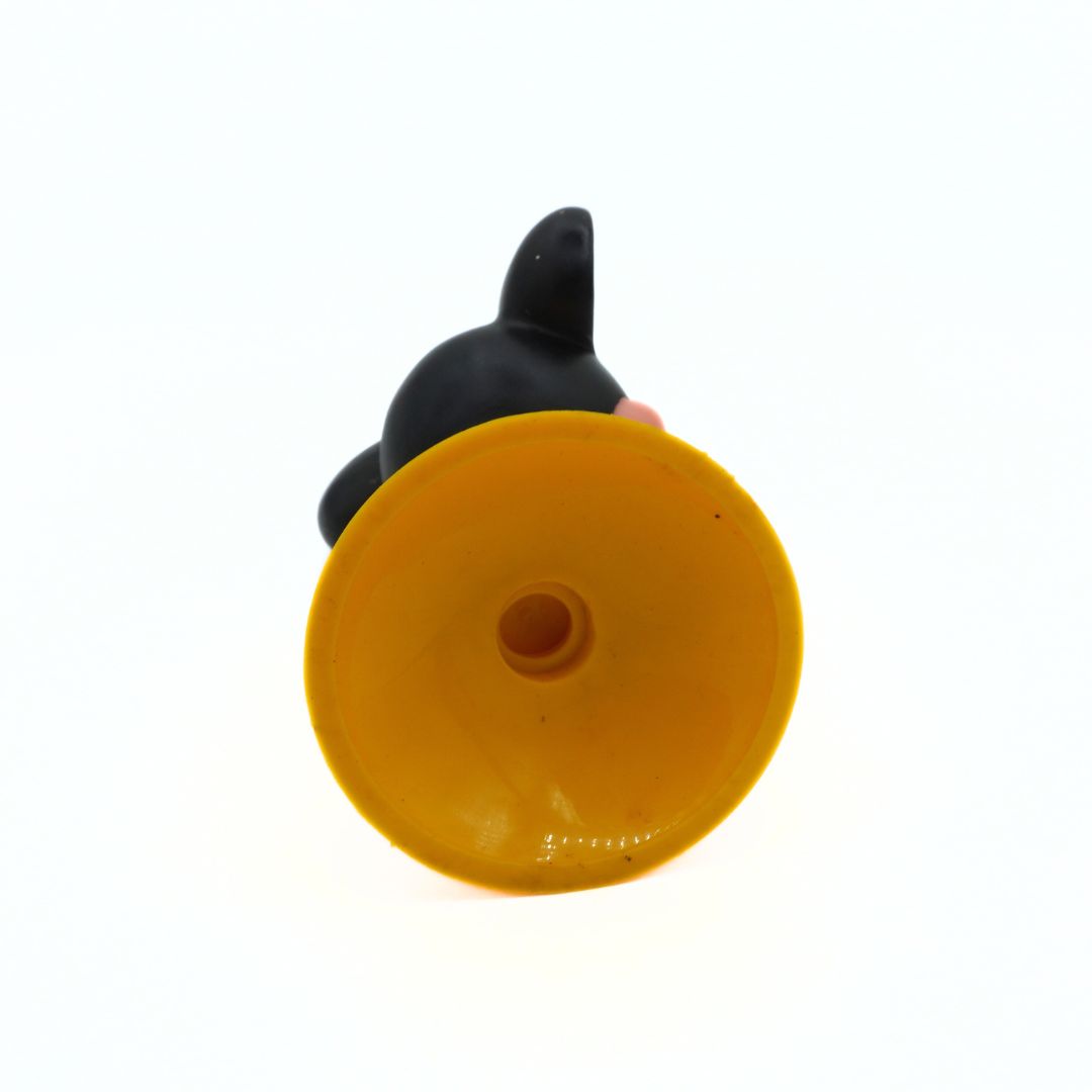 Black and yellow suction cup on a white background