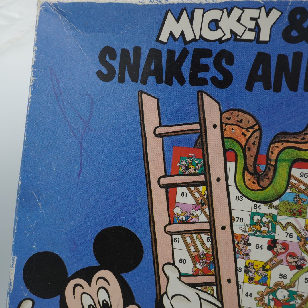 Texta mark to front of a vintage Disney Snakes and Ladders game