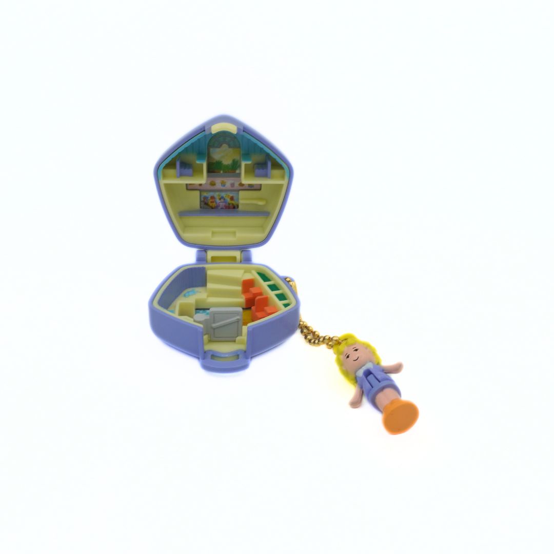 Toy with a colorful interior and a character figure on a white background