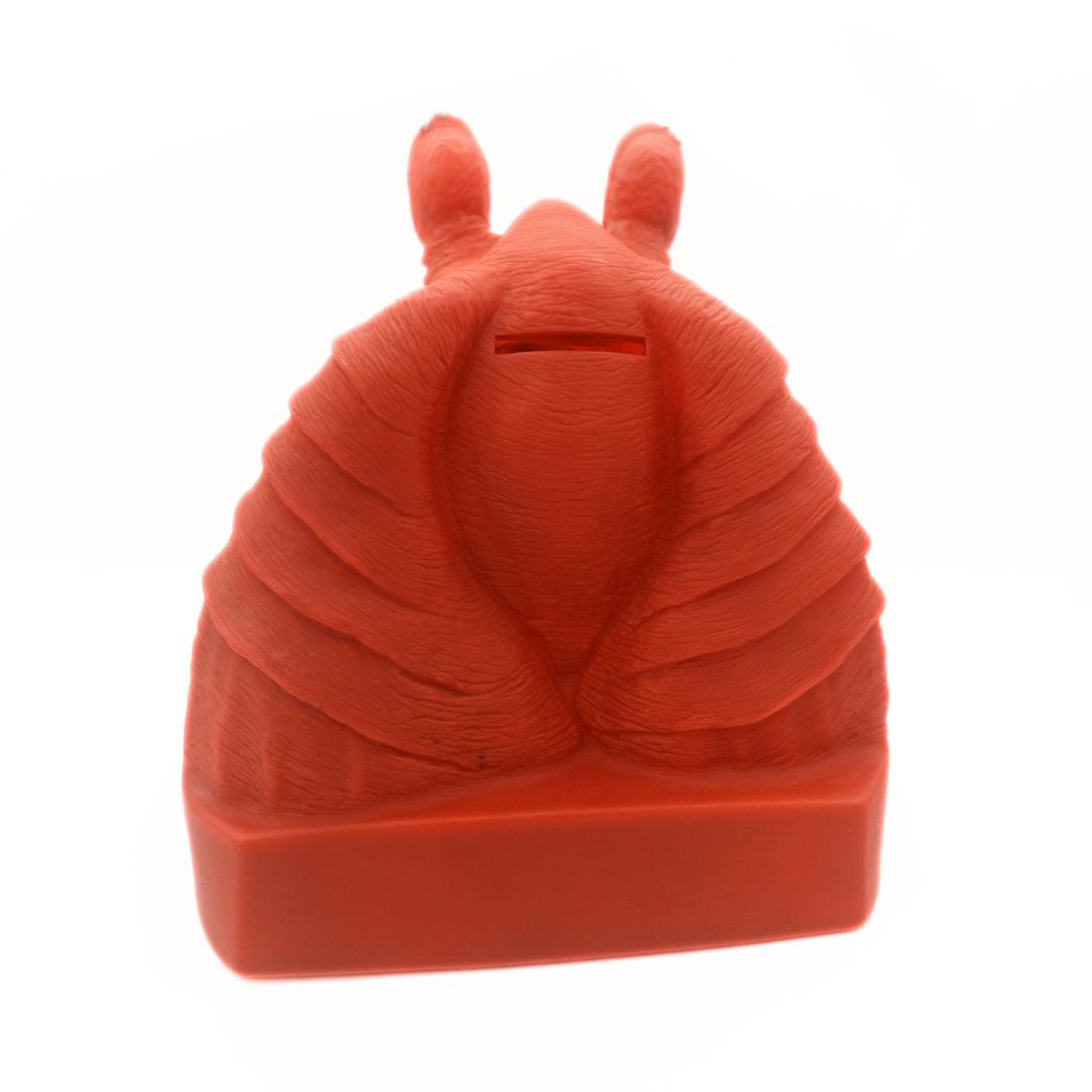 Photo of the back of a 90s Star Wars plastic Jar Jar Binks piggy bank
