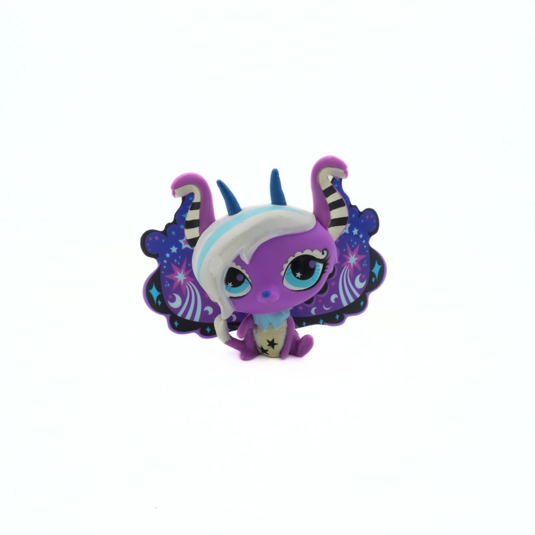 Colorful figurine with butterfly wings on a white background
