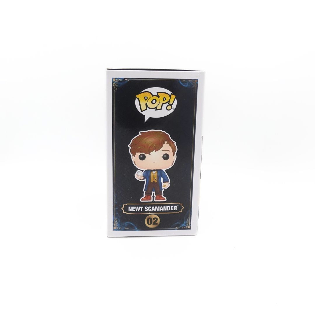 Side on photo of the Newt Scamander Funko Pop packaging showing an illustration of the figure