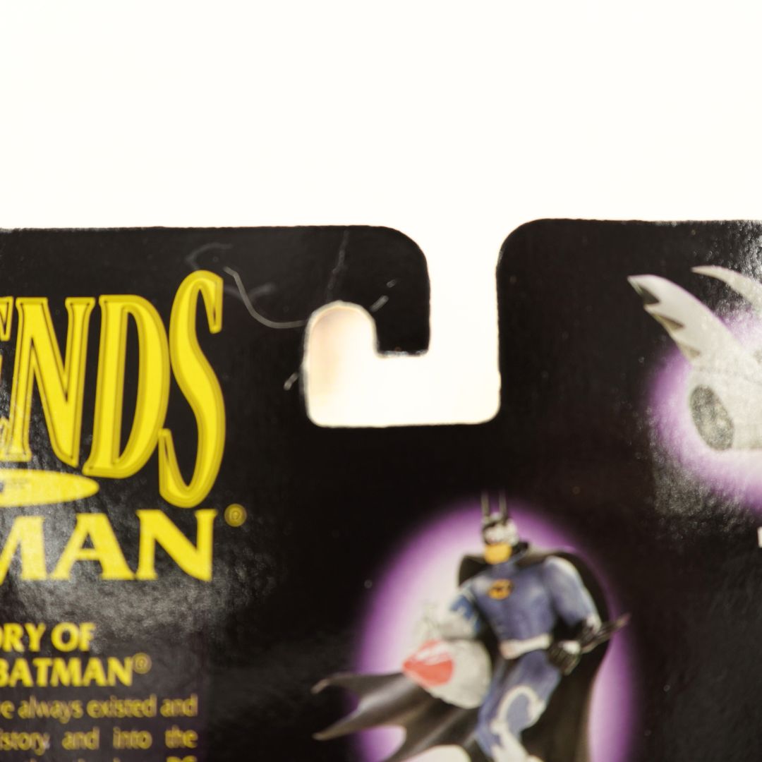 Creasing and wear to the swingtag on the 1994 Nightwing cardback