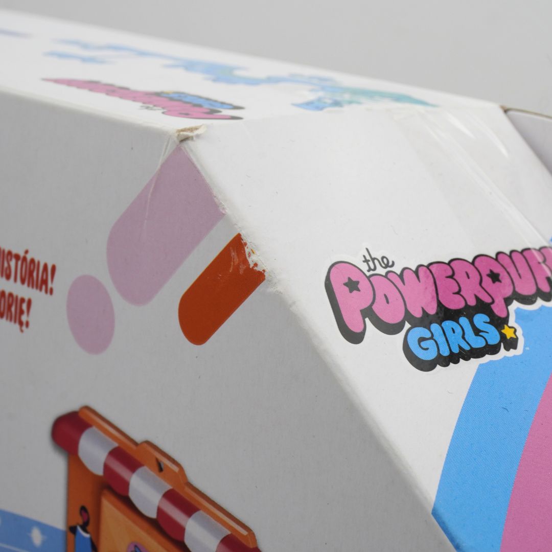Close-up of a toy packaging with 'Powerpuff Girls' branding.