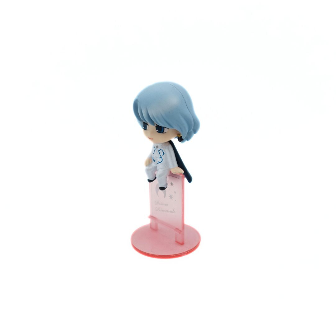Mini Sailor Moon Prince Demande figurine balancing on a small pink stand