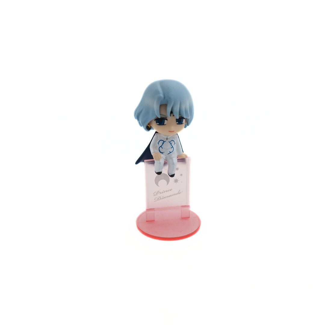 Mini Sailor Moon Prince Demande figurine balancing on a small pink stand