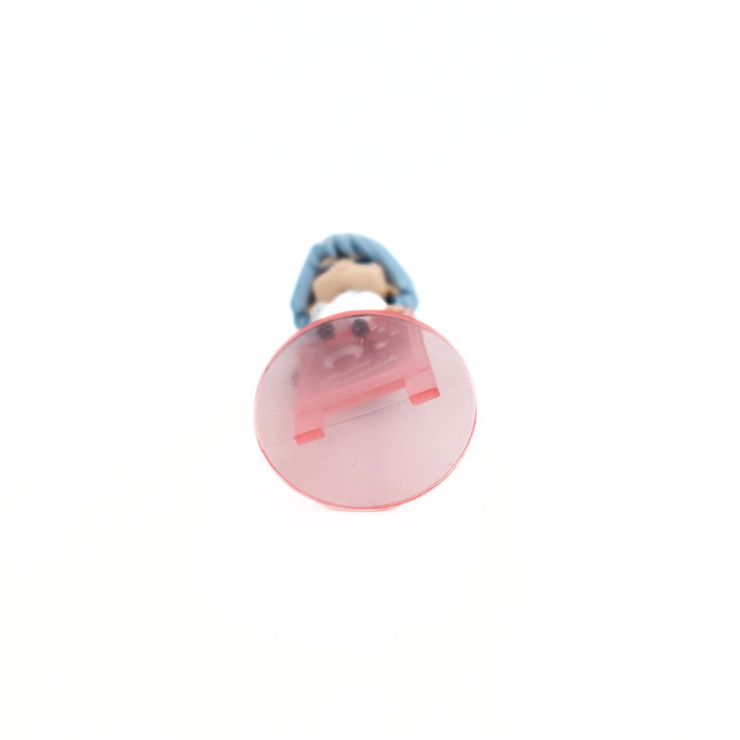 Underside of the Prince Dimande mini figure showing the transparent pink stand