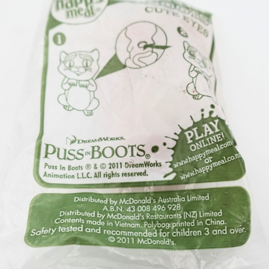 Close up of the branding on a 2011 McDonalds Happy Meal Dreamworks Puss in Boots toy