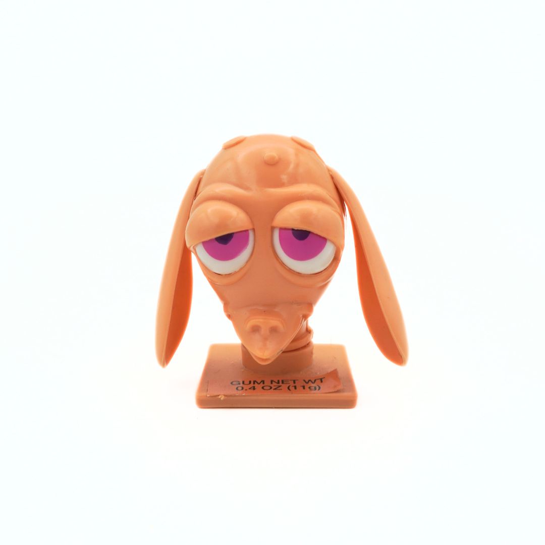 1994 Nickelodeon Ren & Stimpy candy head with a sticker detailing the weight of the original gum