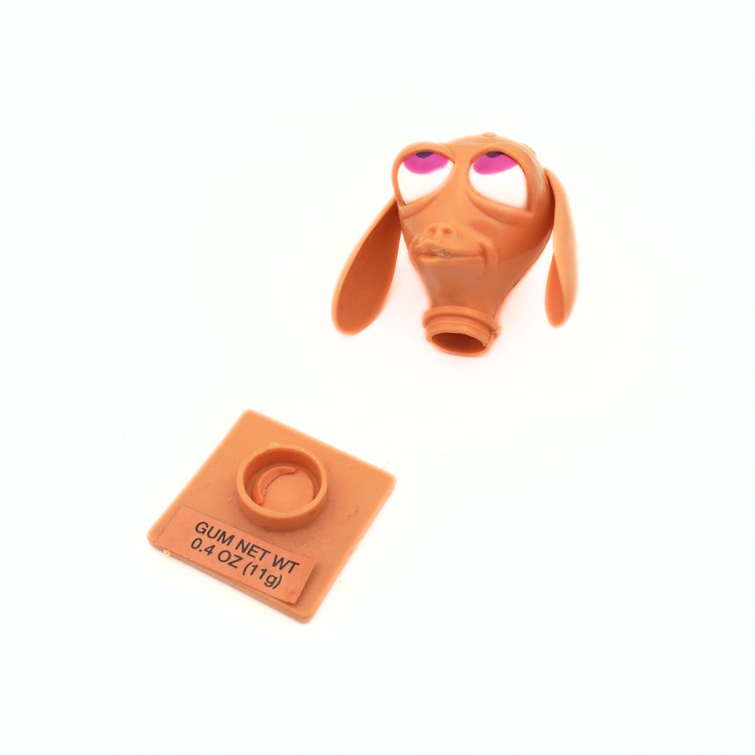 Head and stand from a vintage 90's Ren & Stimpy candy holder