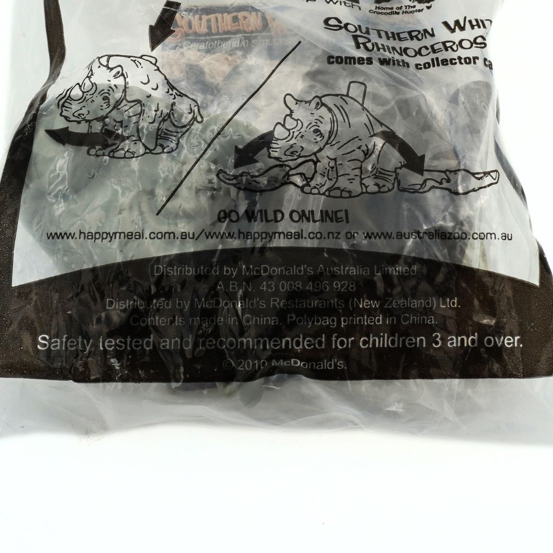 Branding and safety information on a 2010 Southern Cross Rhinoceros McDonalds Australia Zoo toy