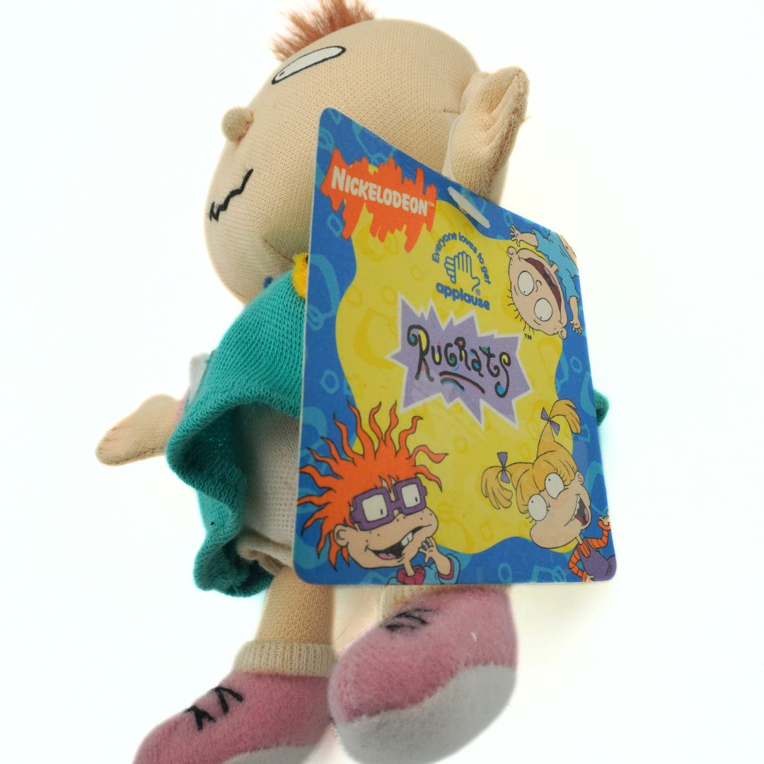 Tag attached to a vintage Rugrats plush doll featuring the Nickelodeon and Rugrats logos