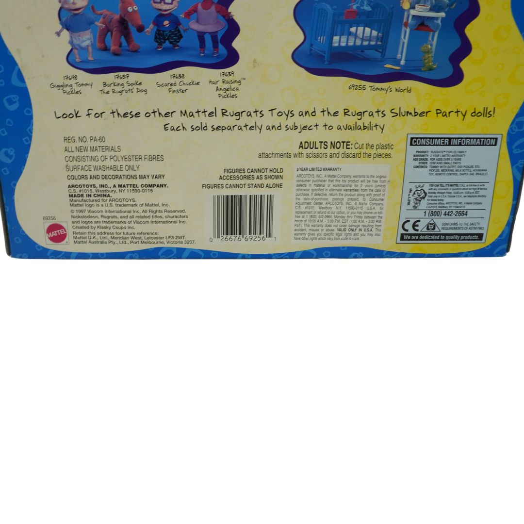Back of a toy packaging with text and graphics, featuring Mattel branding.