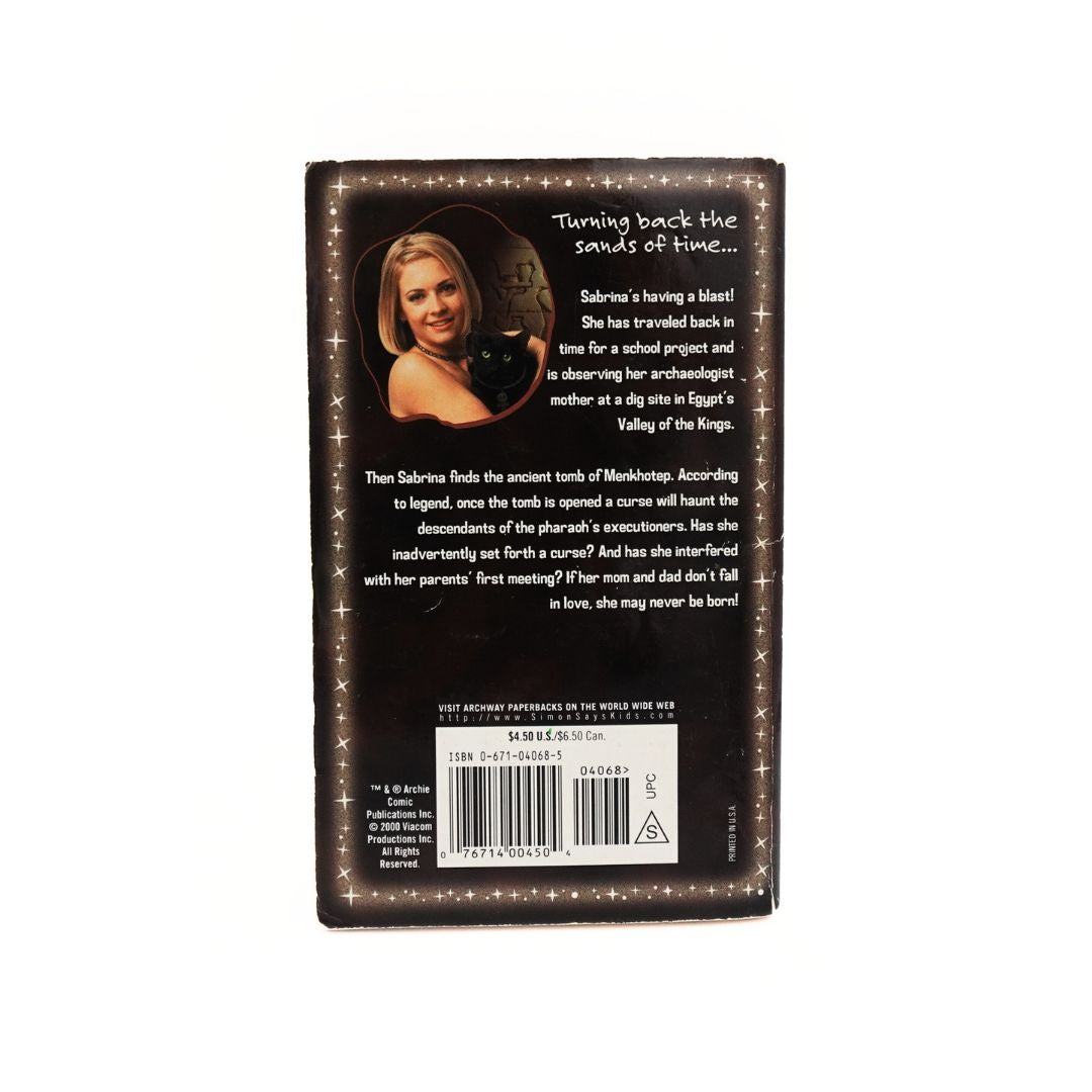 Photo of the back of the 2000 Sabrina the Teenage Witch Mummy Dearest book with the plot description and a photo of Sabrina and Salem the cat