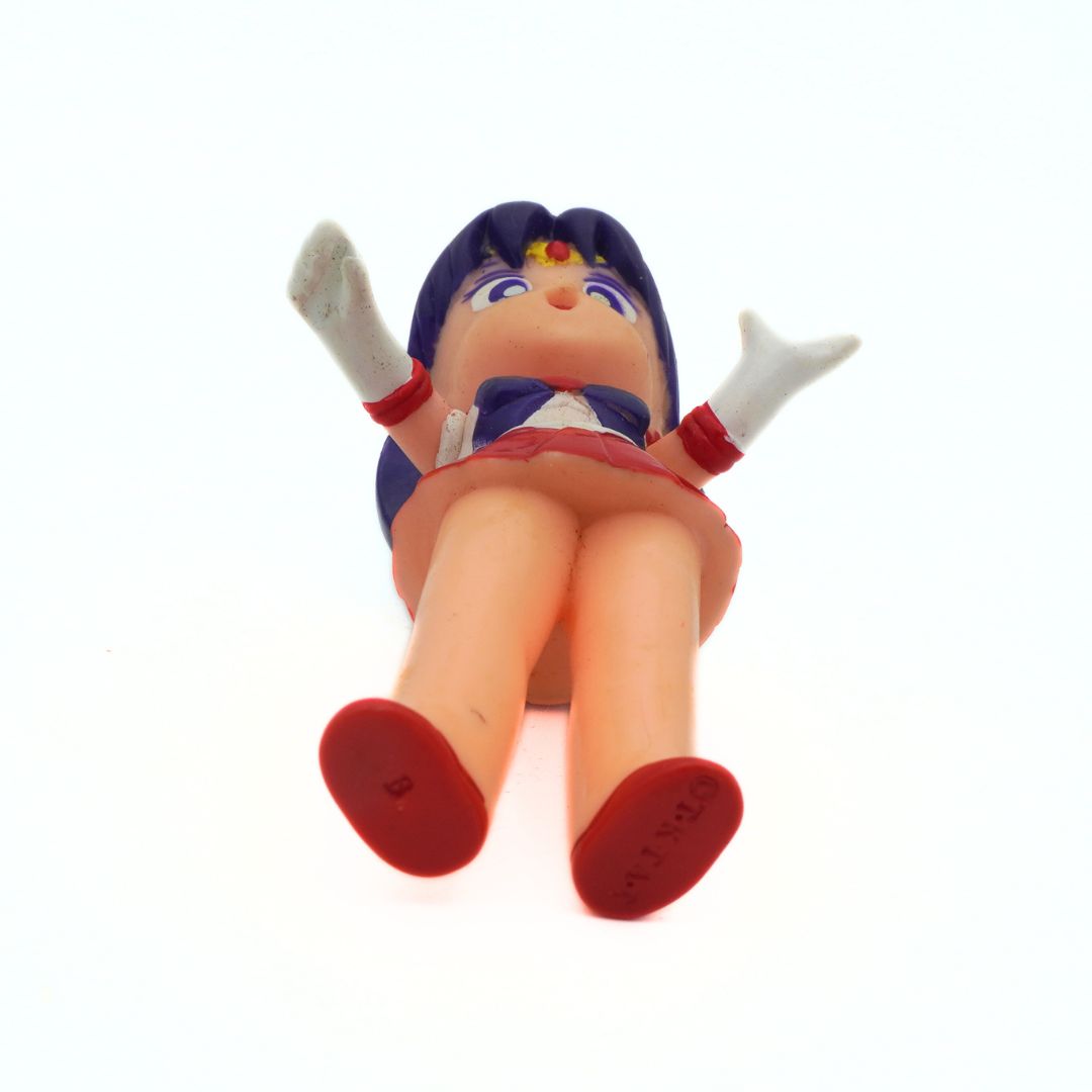 Photo of the underside of a vintage Sailor Mars figure, released in 1994