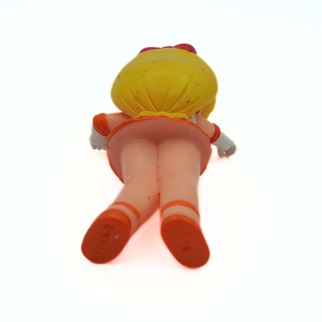 Underside of a 1994 Sailor Venus figurine showing the branding debossed under the shoe