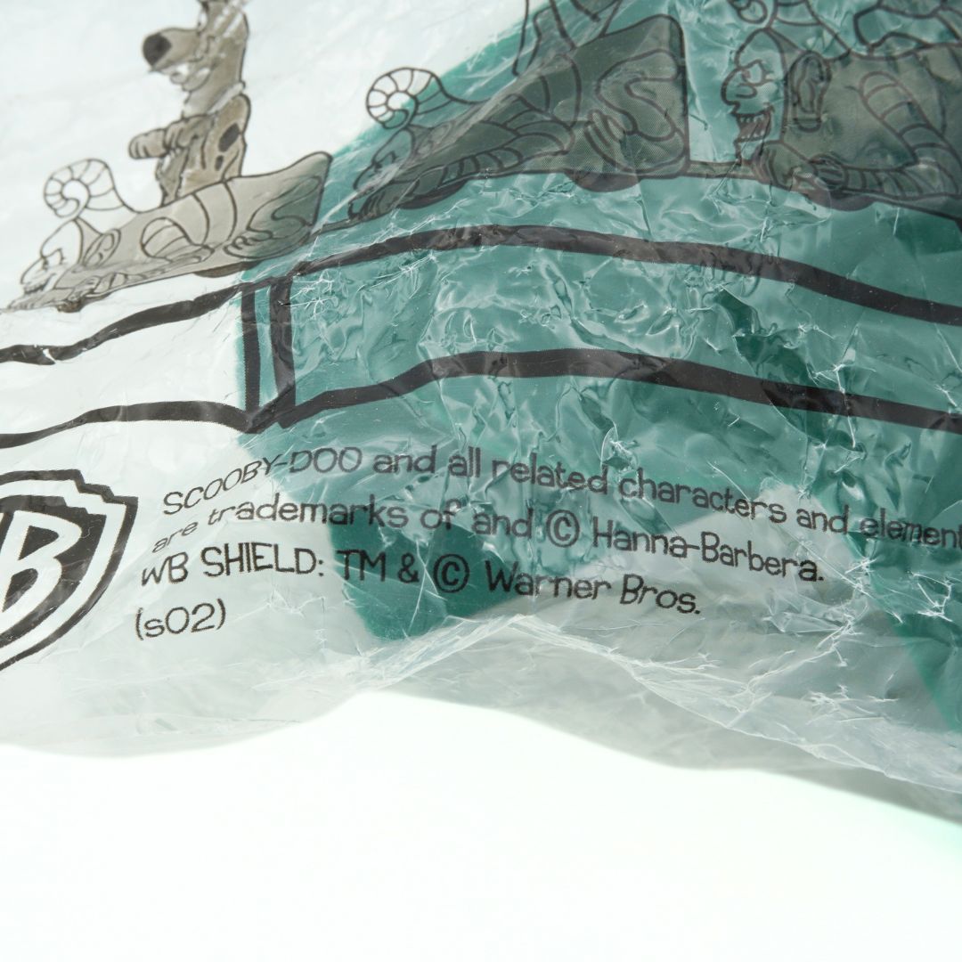 Close up of the branding on a vintage 2002 Scooby Doo Spooky Coaster toy released through Hungry Jacks