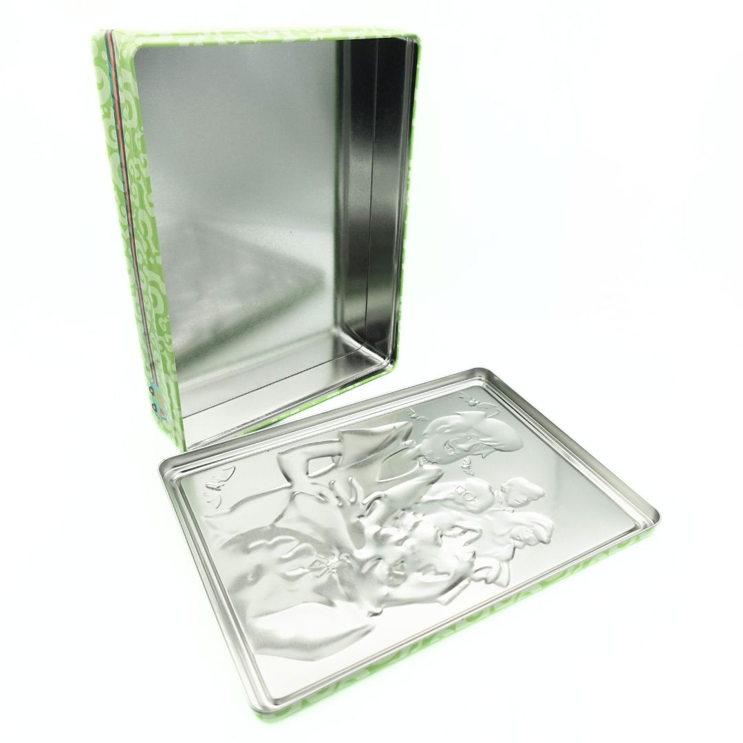 Inside a vintage Scooby Doo tin showing the reverse of the debossed design