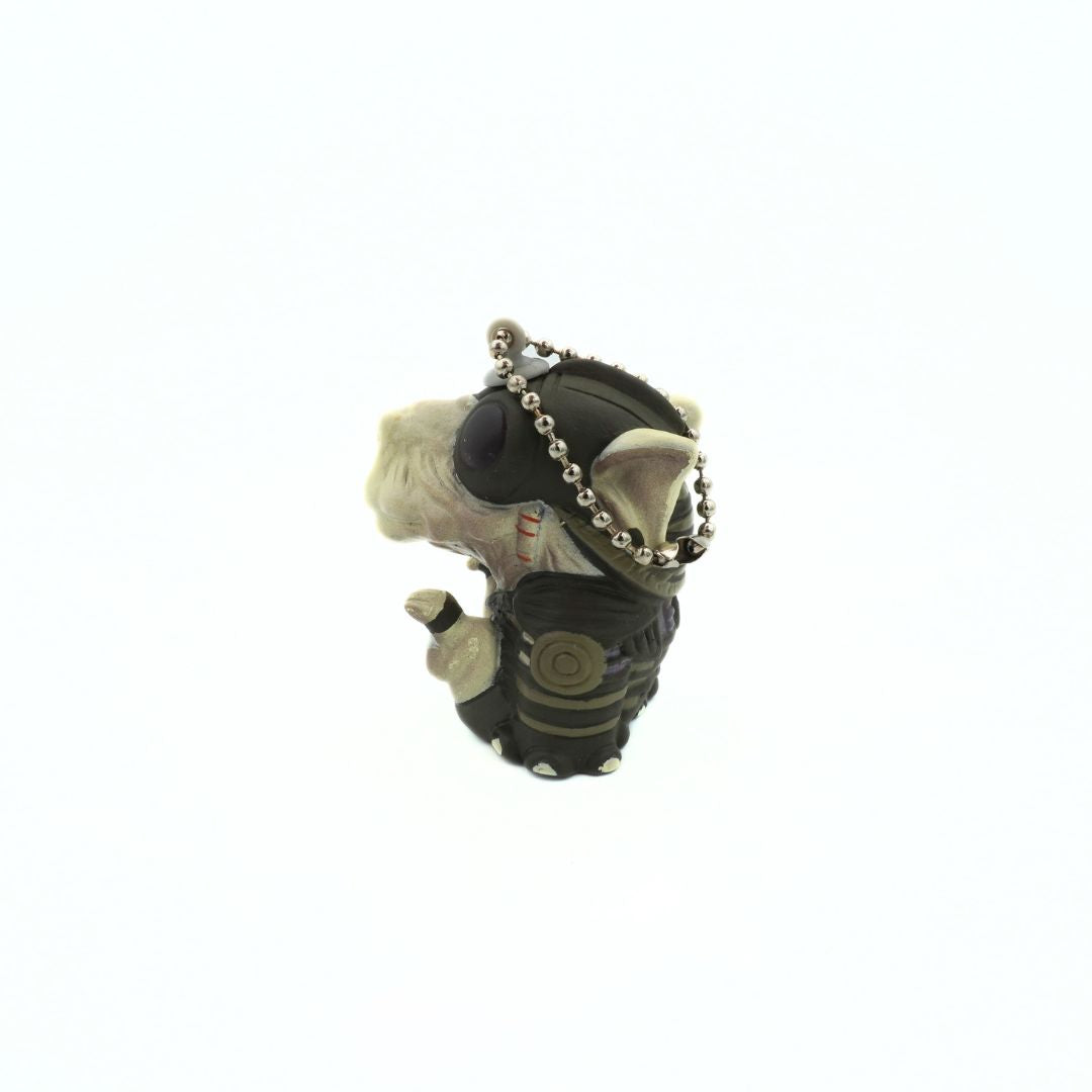 90s Star Wars Phantom Menace Sebulba keychain, with him wearing his podracing outfit