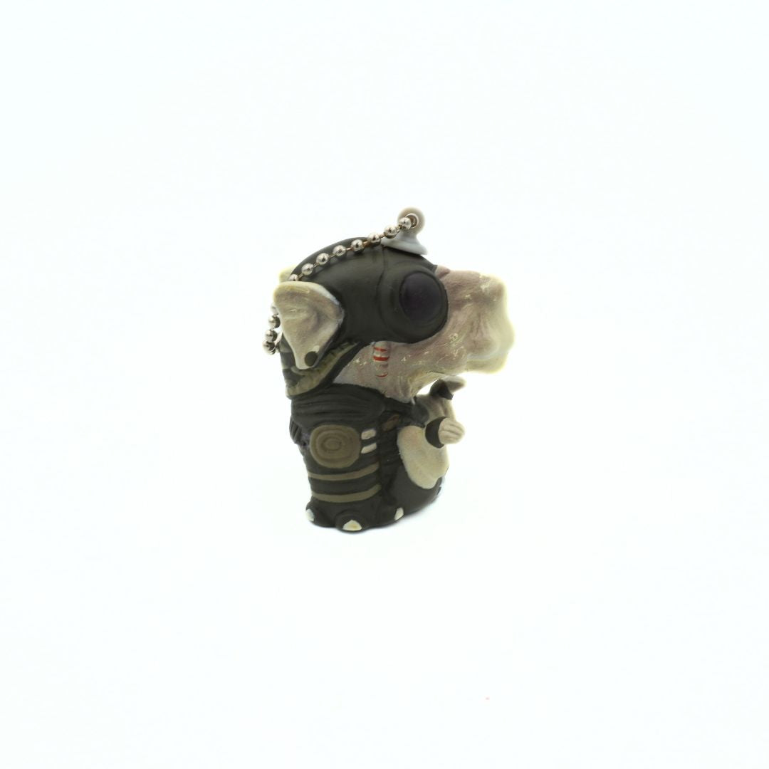 90s Star Wars Phantom Menace Sebulba keychain, with him wearing his podracing outfit