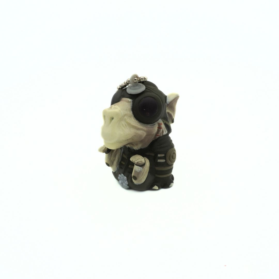 90s Star Wars Phantom Menace Sebulba keychain, with him wearing his podracing outfit