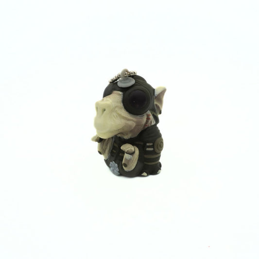 90s Star Wars Phantom Menace Sebulba keychain, with him wearing his podracing outfit