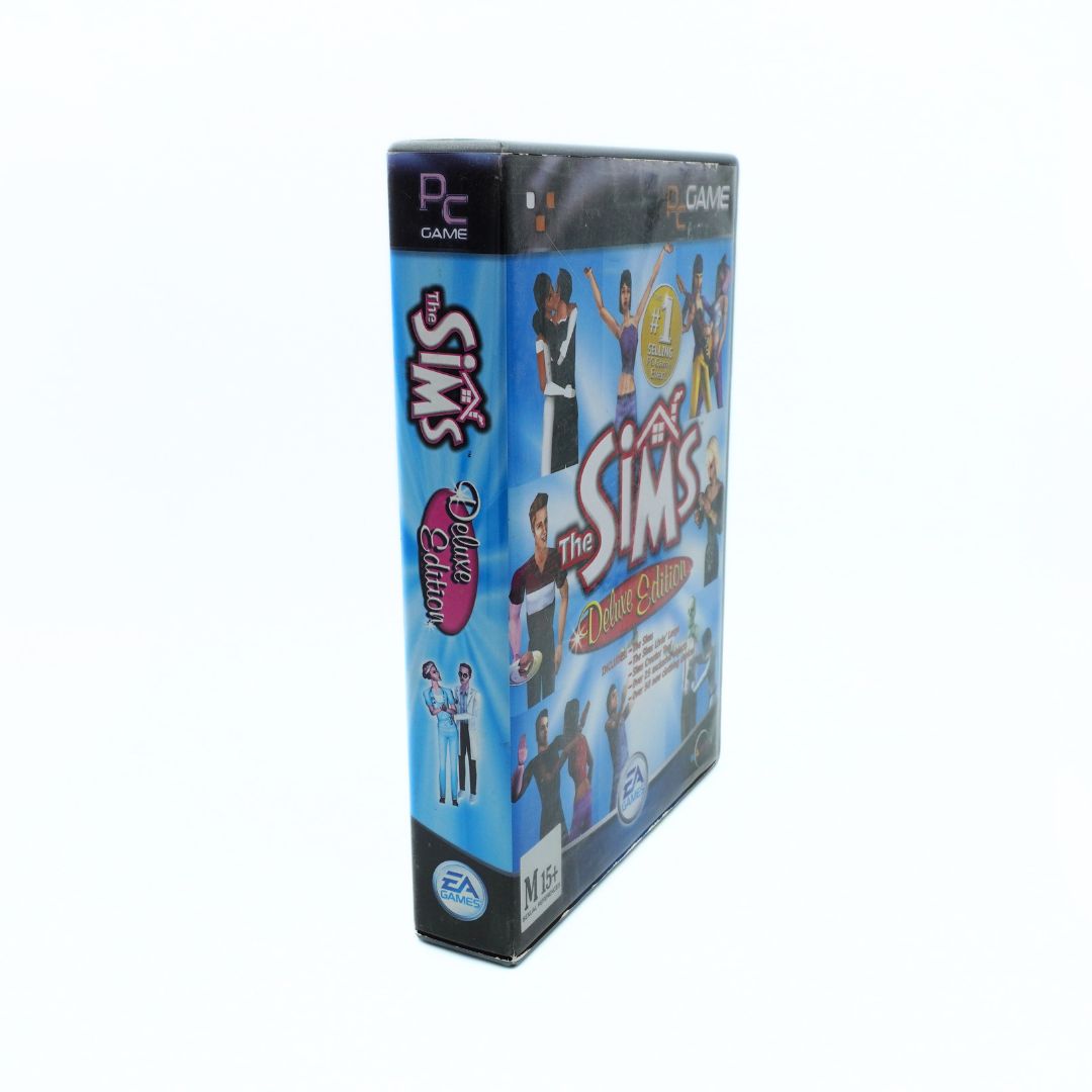 Side on angled photo of the case for the 2002 game The Sims Deluxe Edition