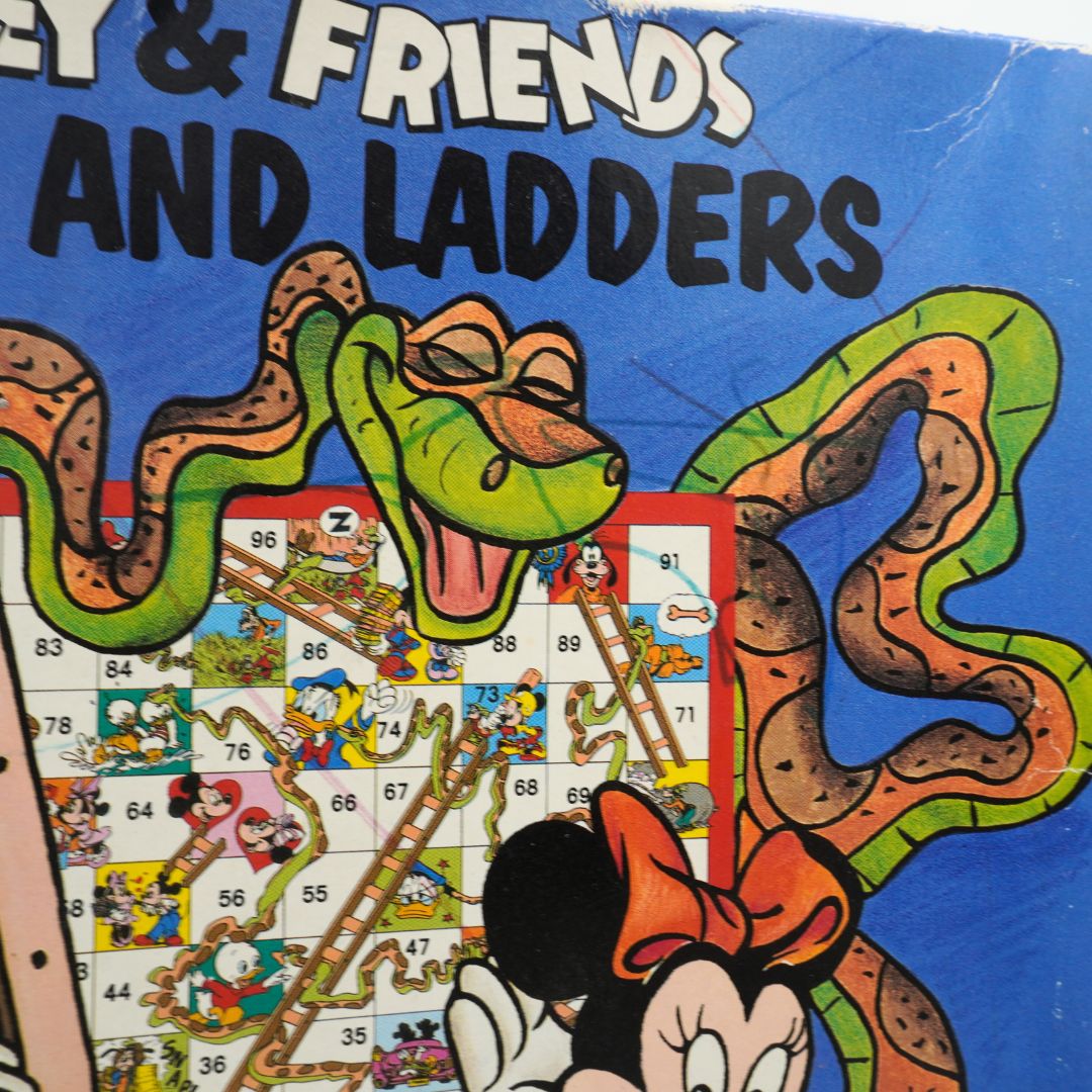 Texta mark to front of a vintage Disney Snakes and Ladders game