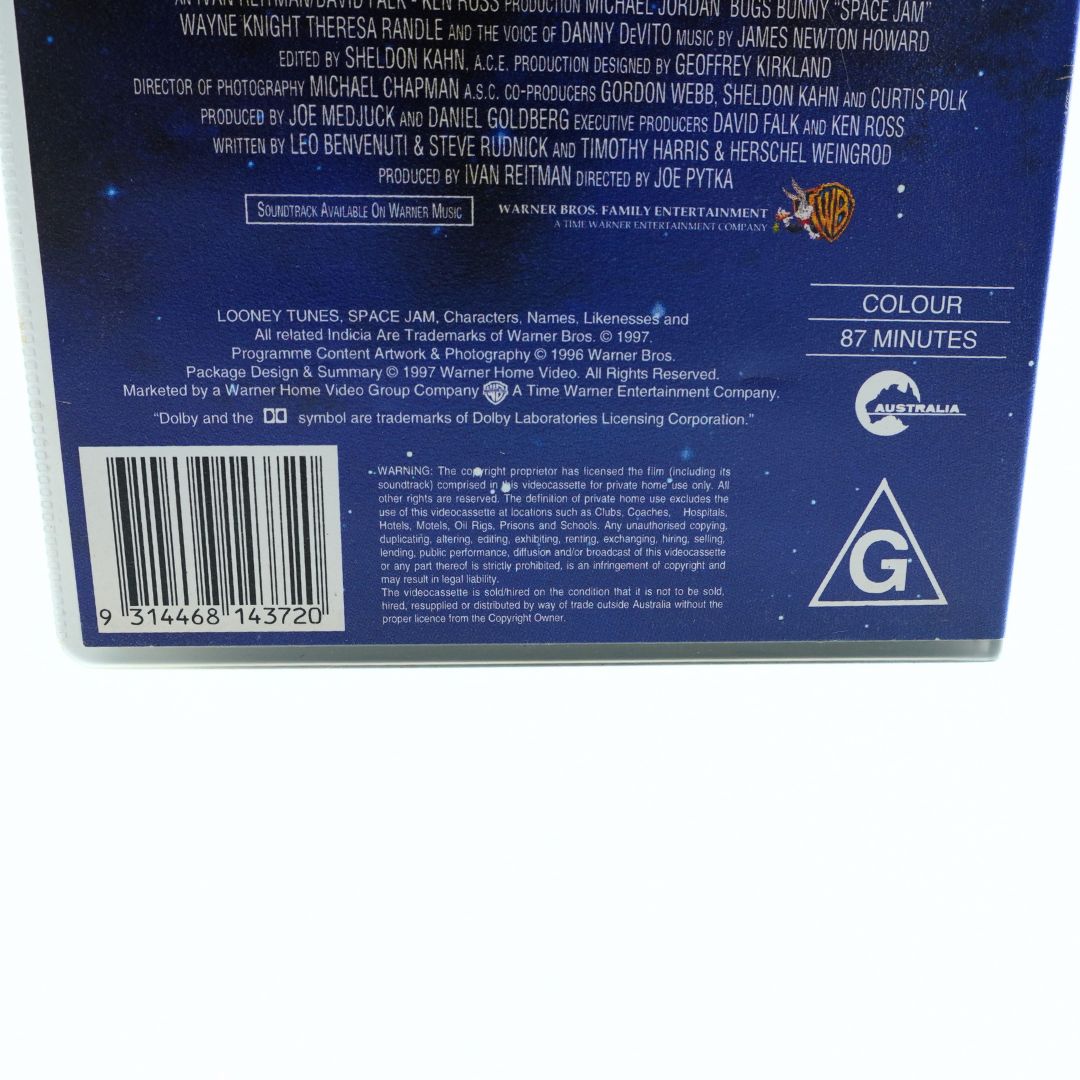 Barcode, copyright and branding information seen on the base of the 1997 VHS tape of Space Jam