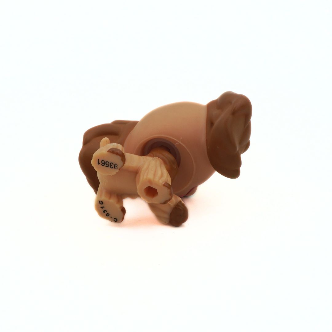 Underside of a brown 2010 Littlest Pet Shop spaniel toy