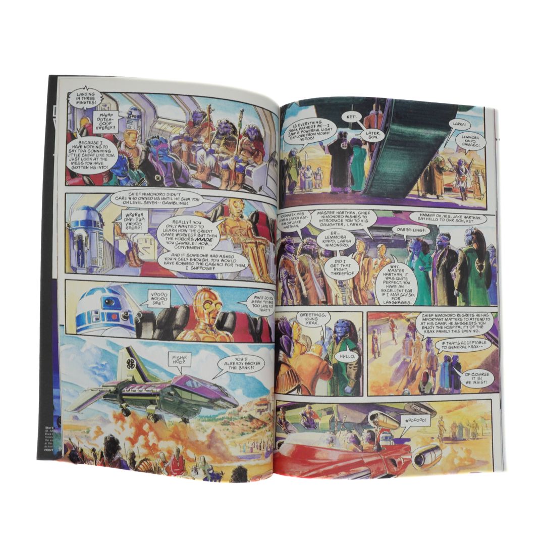 Open comic book with colorful panels and characters on a white background