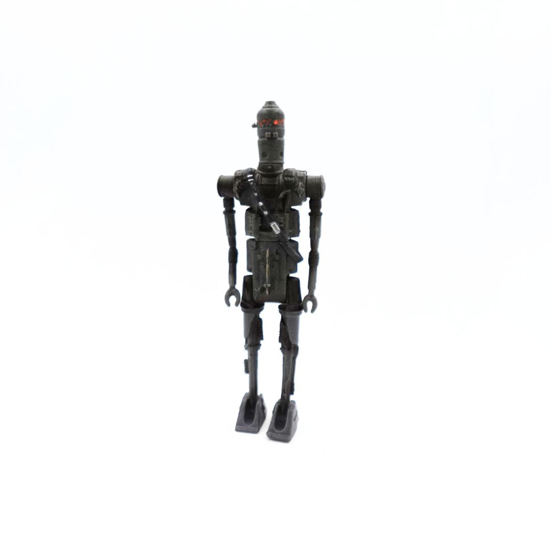 1996 Star Wars IG-88 droid with orange eyes and a dark grey construction