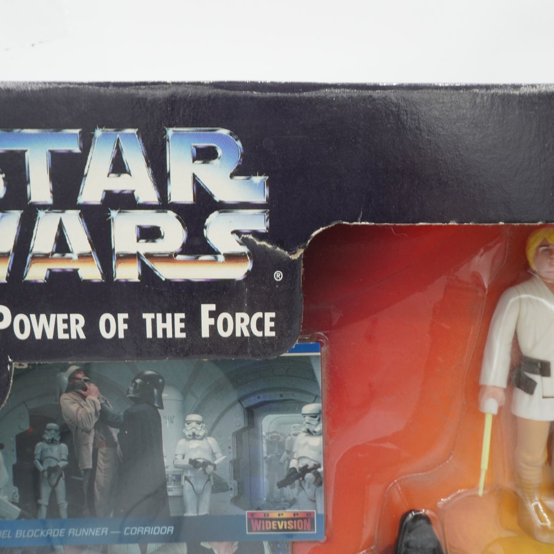 Star Wars action figure in packaging with visible branding