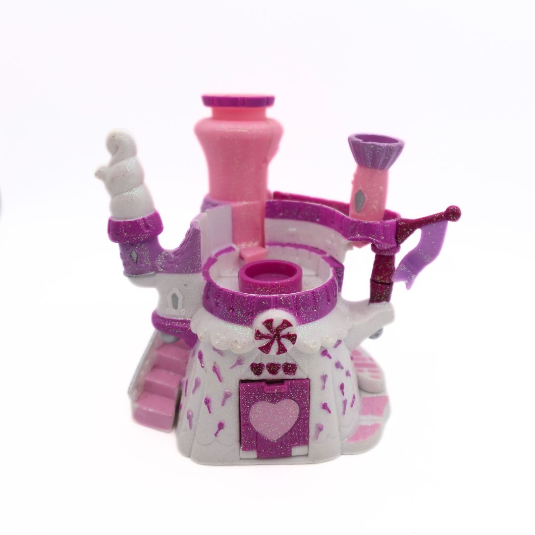 1997 pink, purple and white Starcastle Peppermint Tea castle released by Trendmasters