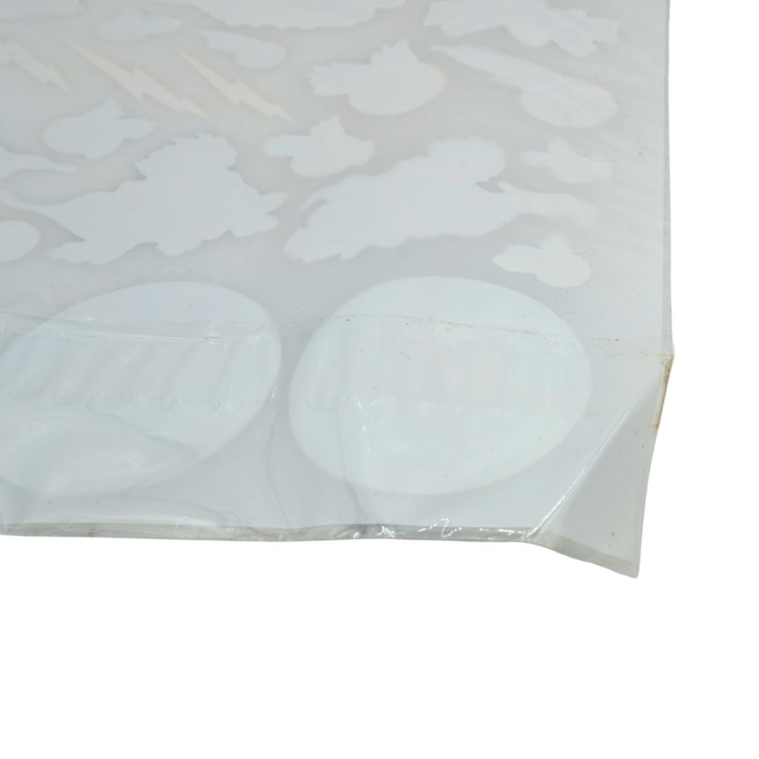Clear plastic sheet with heart shapes on a textured white background